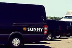 A black van parked in the parking lot