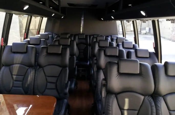 A bus with many seats in it