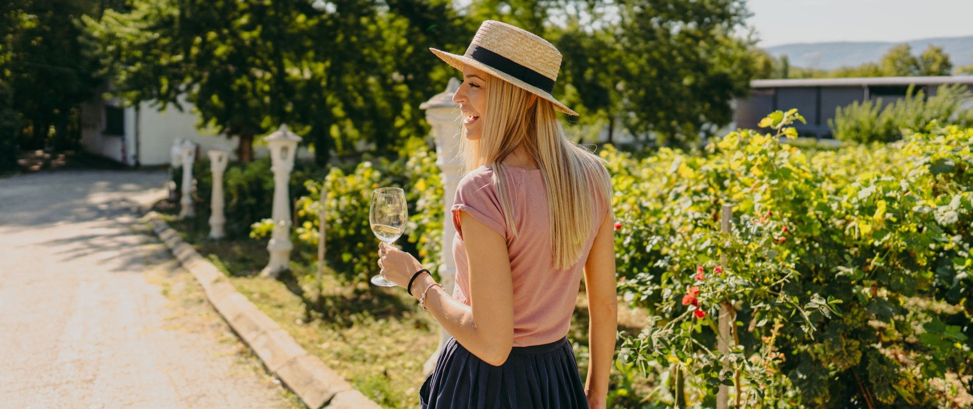 Blonde woman enjoy a glass of wine